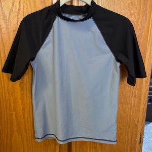 Cherokee boys swim shirt / rash guard.  Grey with black sleeves.  Size L (12-14)